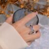 Unique Rainbow Cubic Zirconia Cross Band