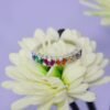Emerald Cut Rainbow CZ Cross Design Band